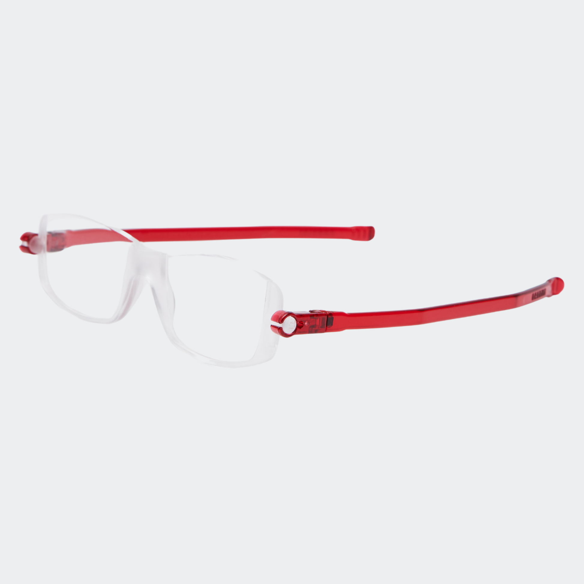 Red eyeglasses with white arms on a light gray background
