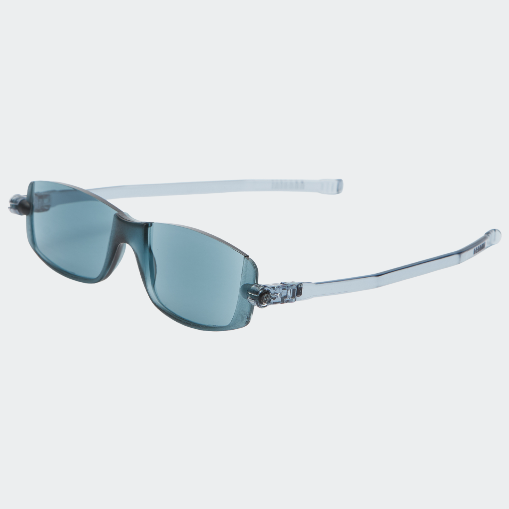 Folding reading sunglasses with grey lenses and clear frame on a white background
